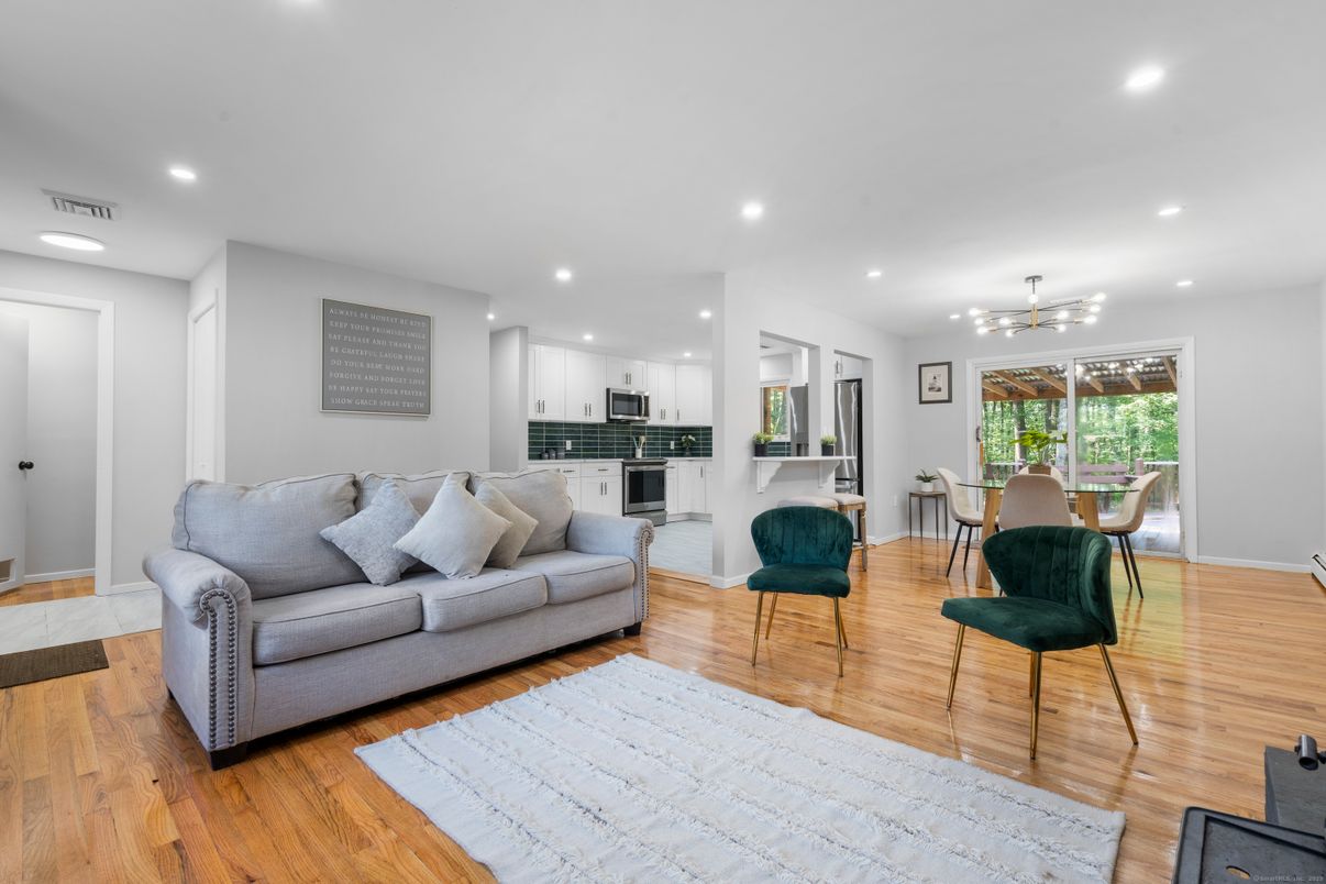 Dining room, Interior, Kitchen, Living room, Recessed Lighting, Stainless Steel Appliances, Wood Texture Flooring