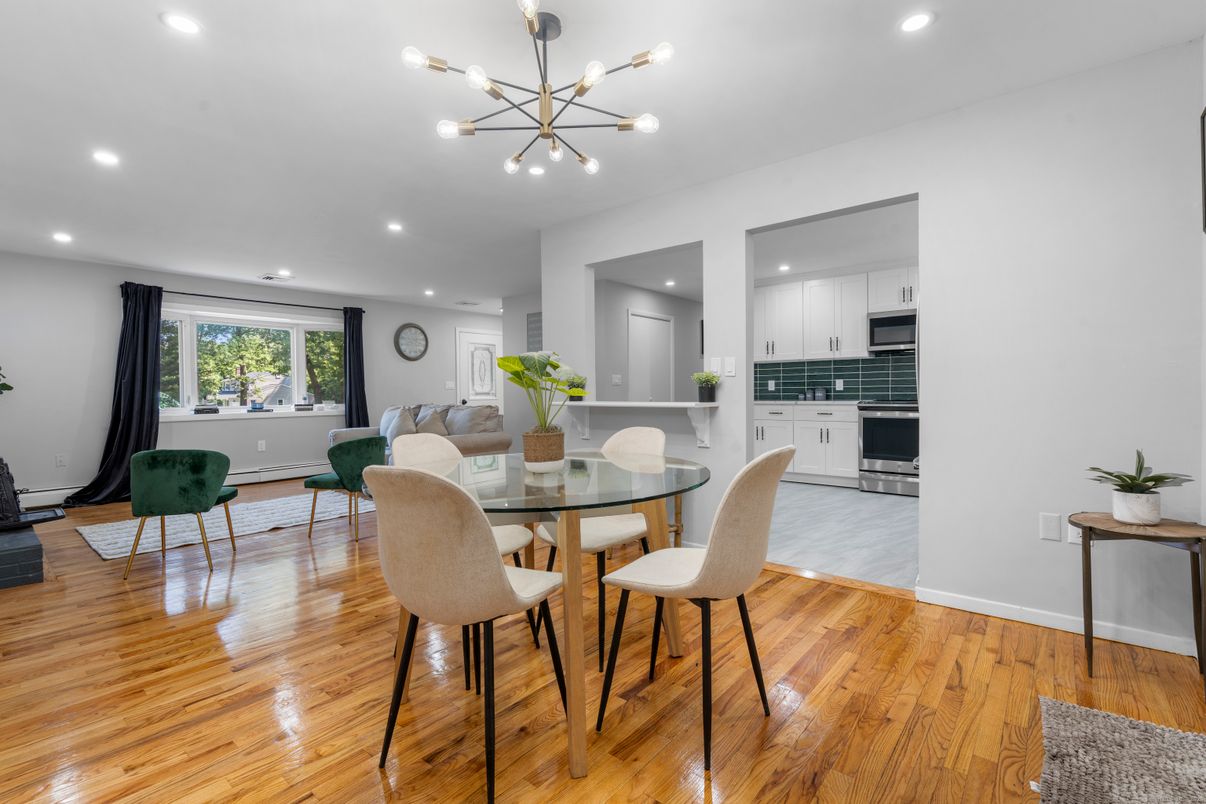 Dining room, Interior, Kitchen, Living room, Pendant Lights, Recessed Lighting, Stainless Steel Appliances, Wood Texture Flooring