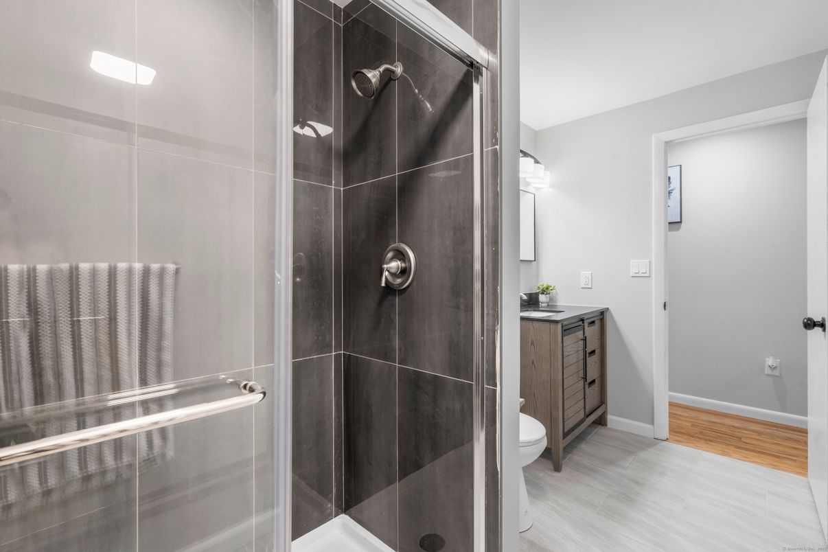 Bathroom, Glass Shower, Interior, Recessed Lighting, Wood Texture Flooring