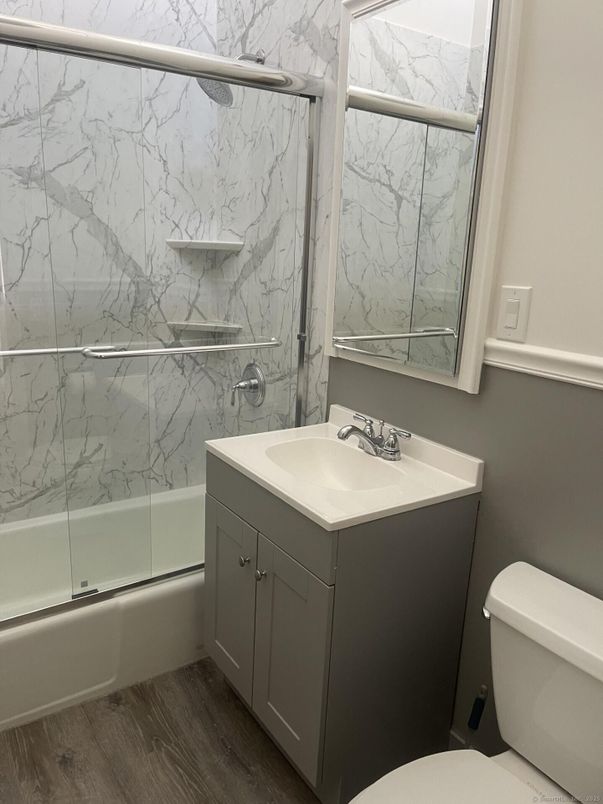 Bathroom, Glass Shower, Interior, Marble Walls, Wood Texture Flooring