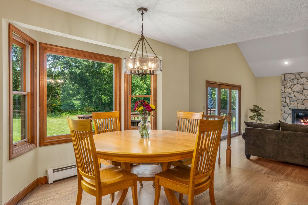 Dining room, Fireplace, Interior, Pendant Lights, Recessed Lighting, Wood Texture Flooring