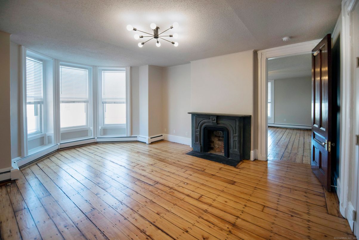 Empty room, Fireplace, Interior, Pendant Lights, Wood Texture Flooring