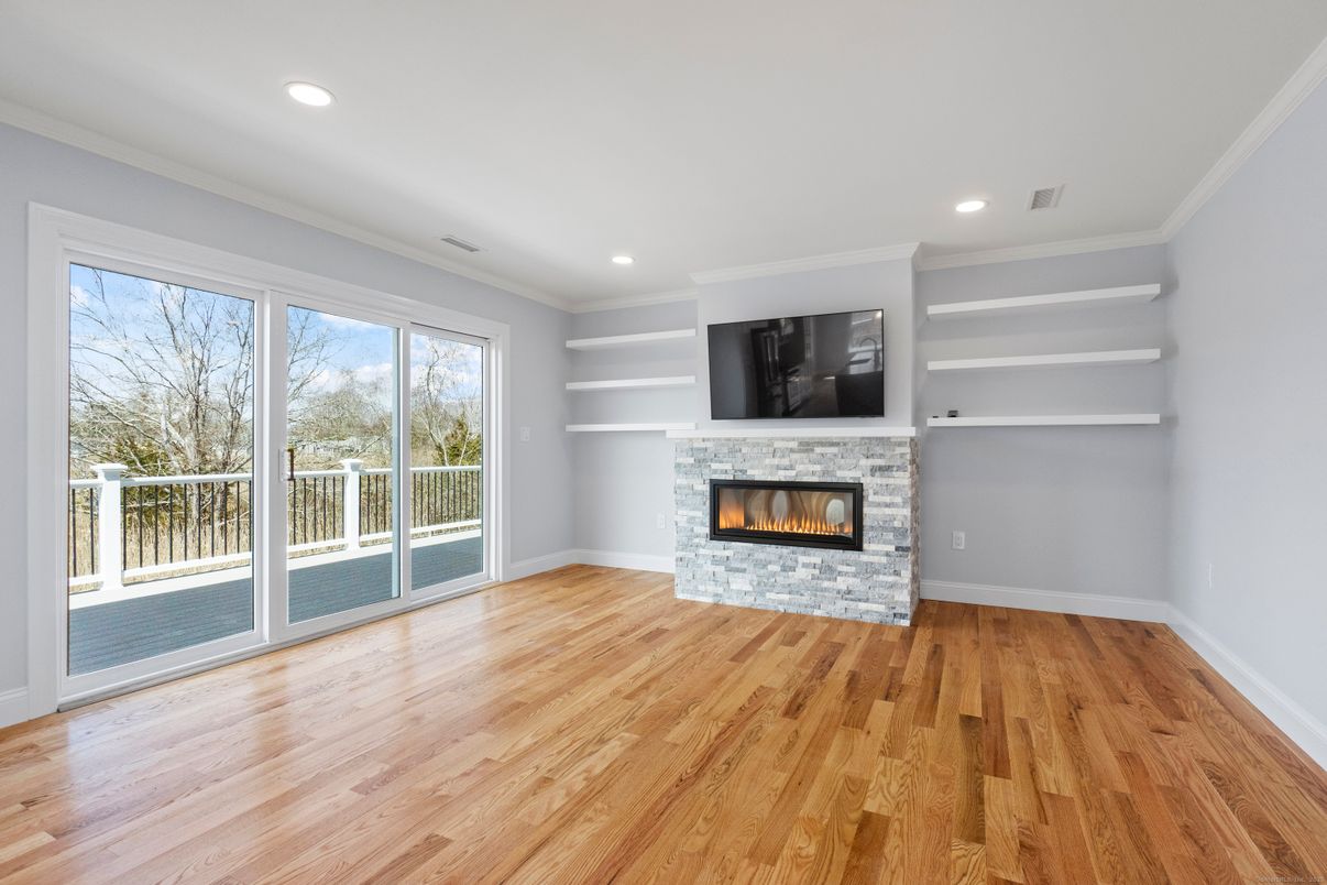 Empty room, Fireplace, Interior, Recessed Lighting, Wood Texture Flooring