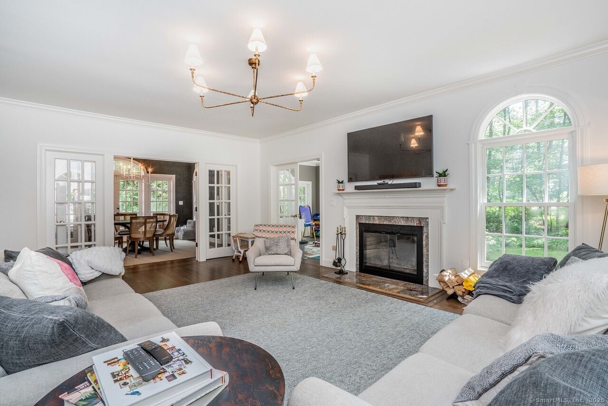 Chandelier, Dining room, Fireplace, Interior, Living room, Wood Texture Flooring