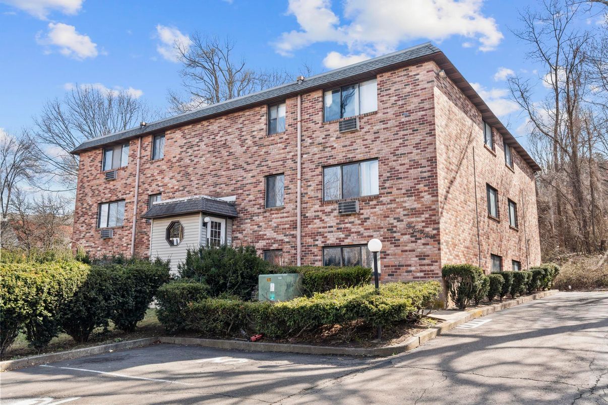 Exterior, Facade, Brick Facade, Condo Building