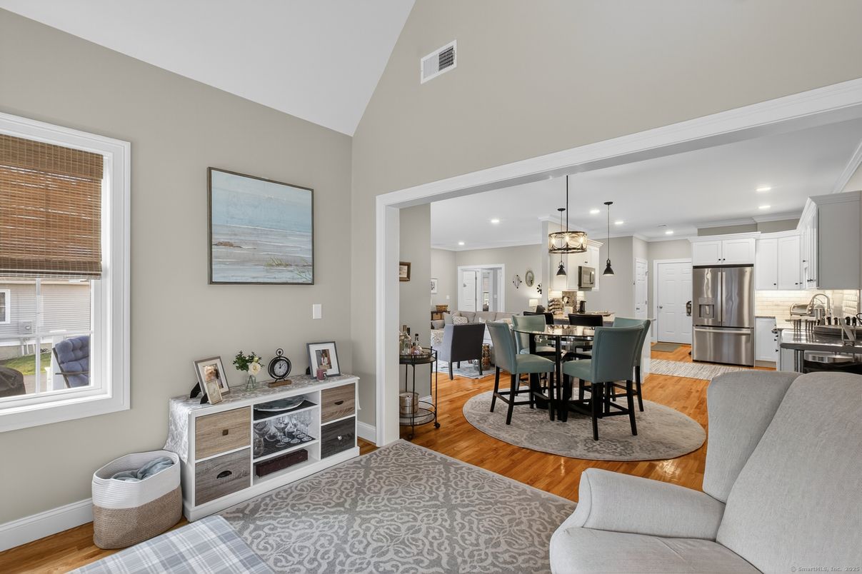 Dining room, Interior, Kitchen, Pendant Lights, Recessed Lighting, Stainless Steel Appliances, Wood Texture Flooring