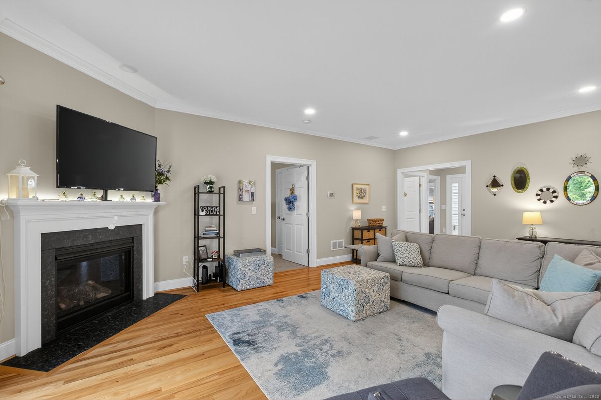 Fireplace, Interior, Living room, Recessed Lighting, Wood Texture Flooring