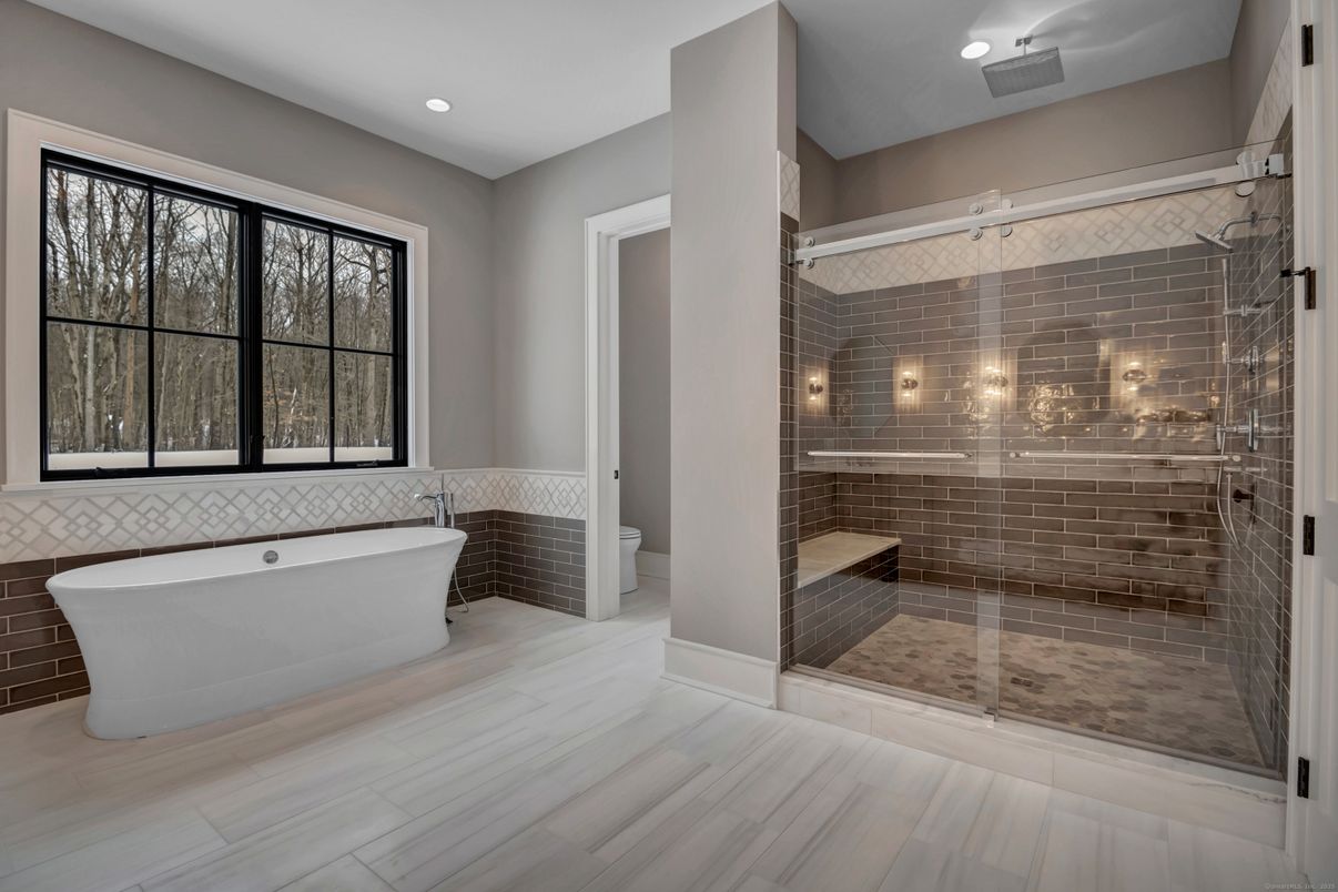 Bathroom, Free Standing Baths, Glass Shower, Interior, Recessed Lighting, Wood Texture Flooring