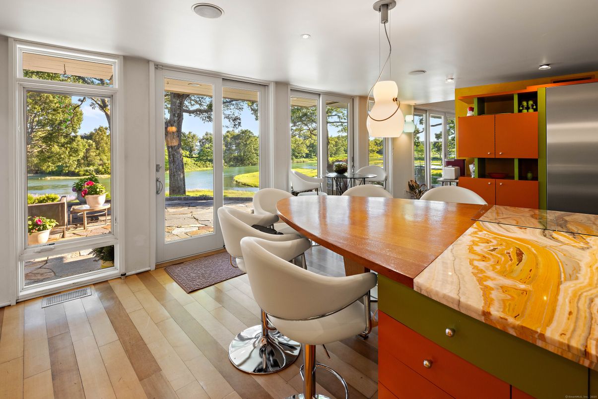 Dining room, Interior, Pendant Lights, Recessed Lighting, Stainless Steel Appliances, Wood Texture Flooring
