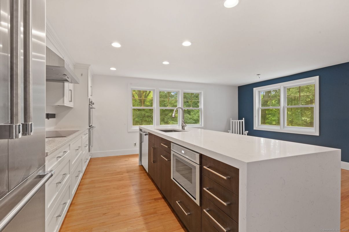 Interior, Kitchen, Recessed Lighting, Stainless Steel Appliances, Wood Texture Flooring