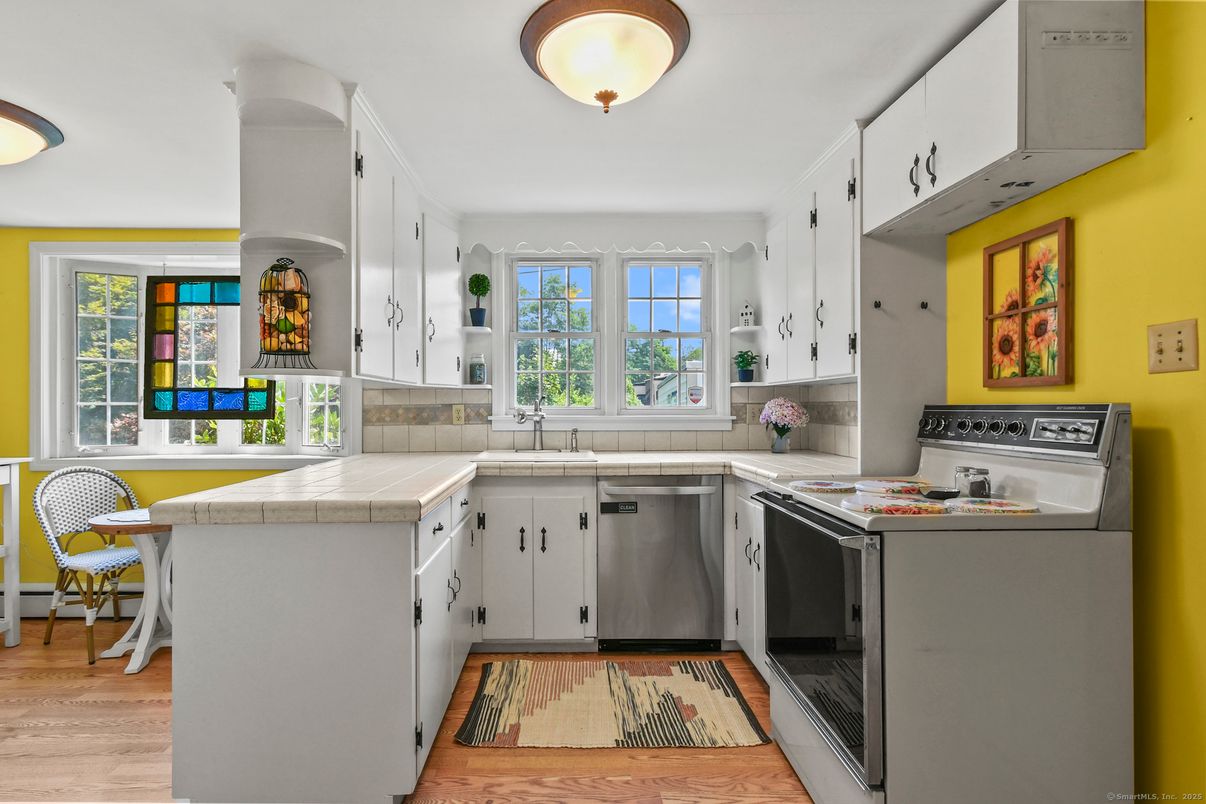 Interior, Kitchen, Tile Countertops, Wood Texture Flooring