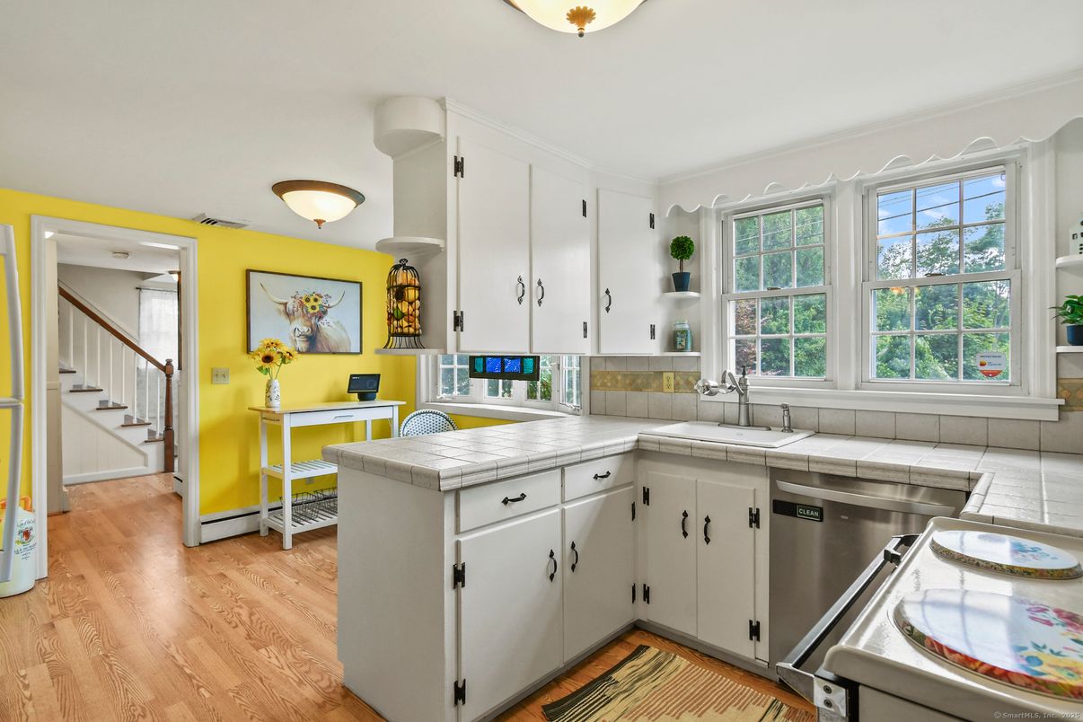 Interior, Kitchen, Tile Countertops, Wood Texture Flooring
