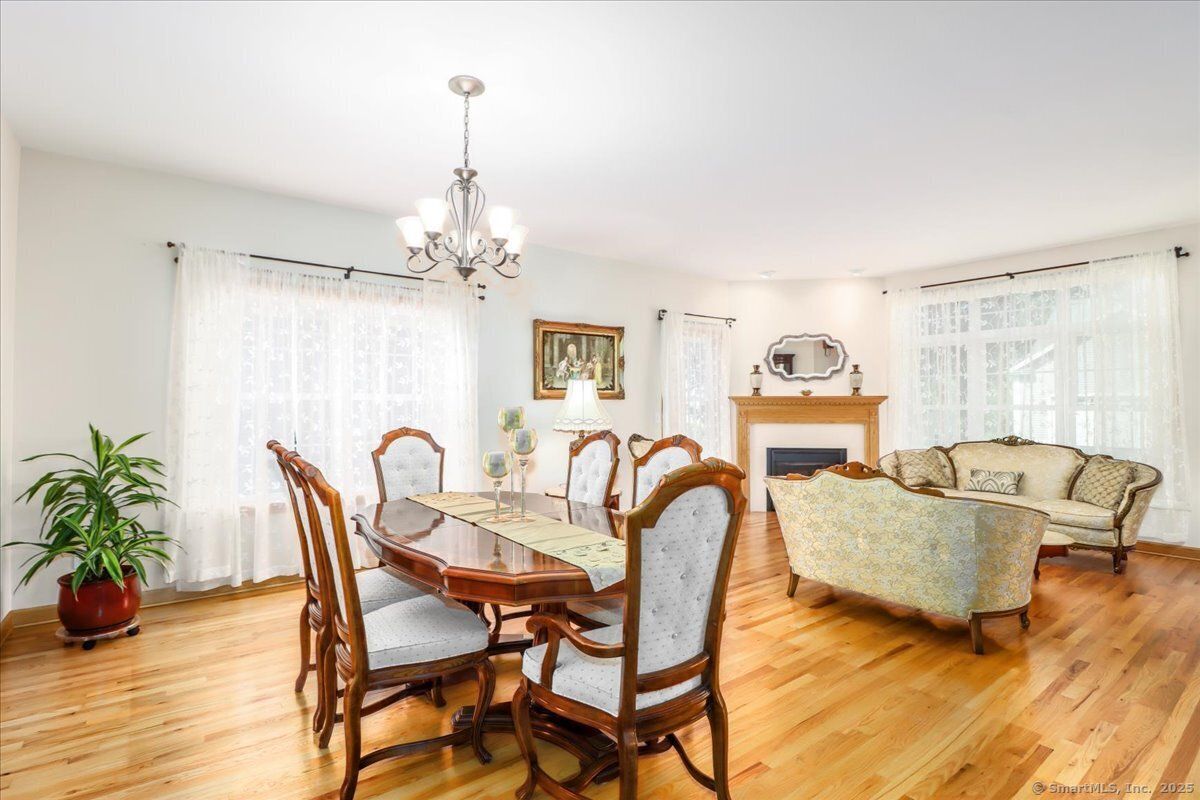 Chandelier, Dining room, Fireplace, Interior, Living room, Wood Texture Flooring