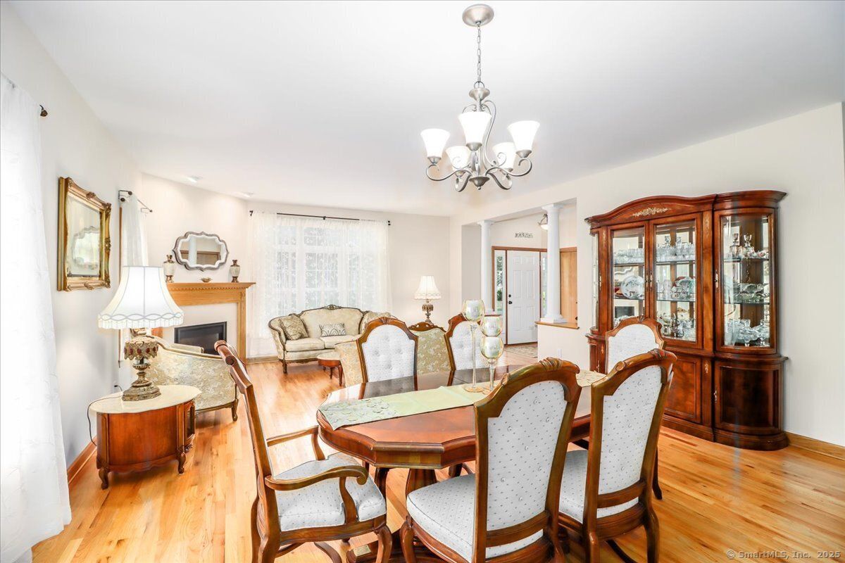 Chandelier, Dining room, Fireplace, Interior, Living room, Wood Texture Flooring