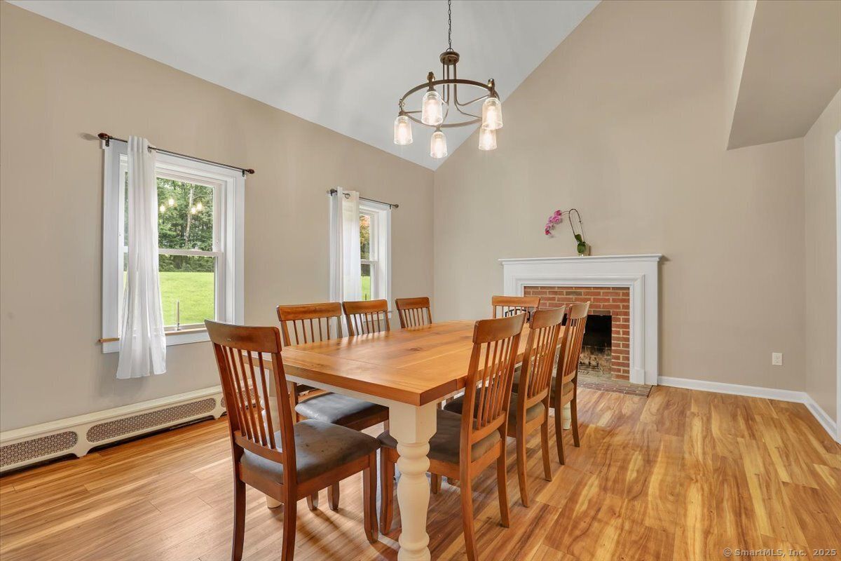 Dining room, Fireplace, Interior, Pendant Lights, Wood Texture Flooring