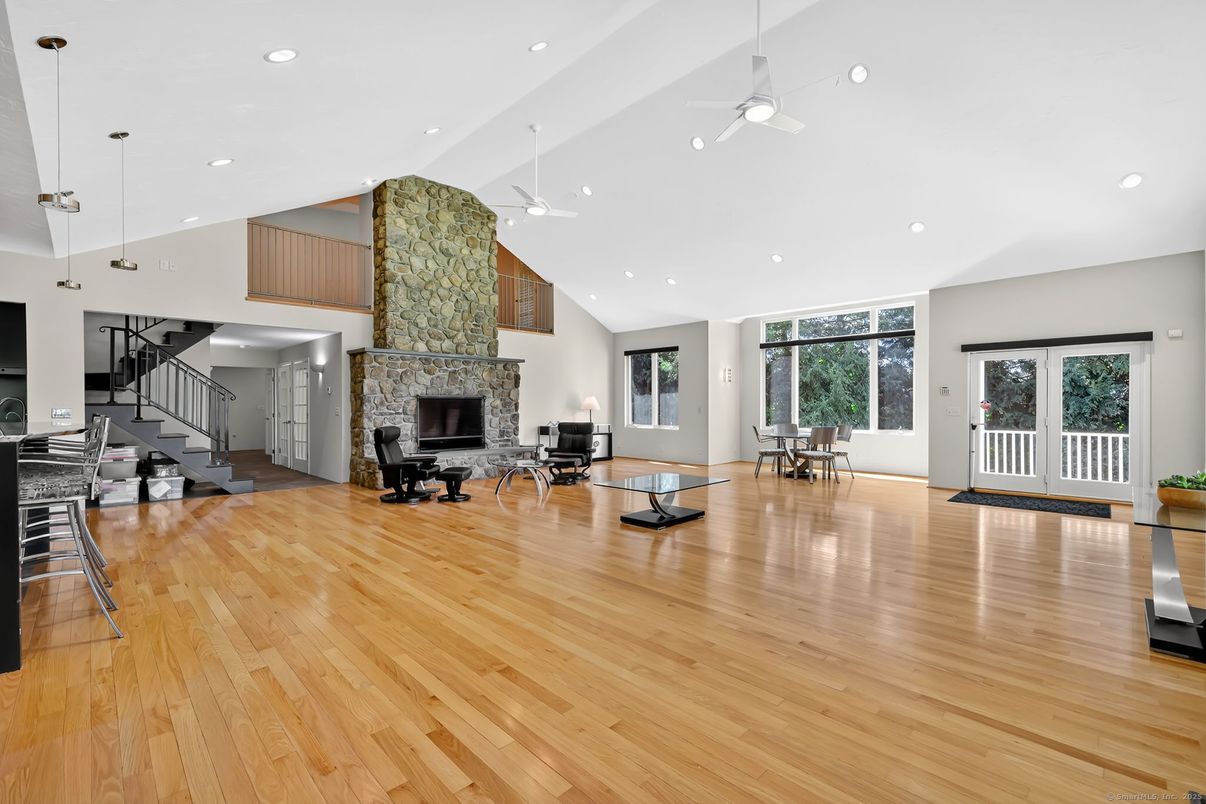 Dining room, Fireplace, Interior, Pendant Lights, Recessed Lighting, Wood Texture Flooring