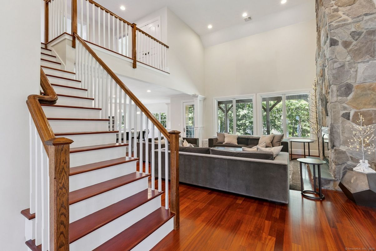 Fireplace, Interior, Living room, Recessed Lighting, Stone Walls, Wood Texture Flooring