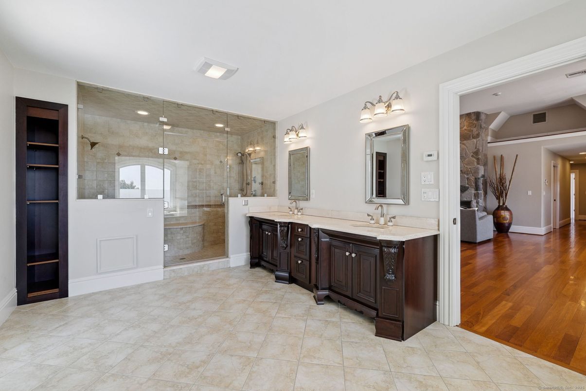Bathroom, Dual Sink Vanities, Glass Shower, Interior, Recessed Lighting, Wood Texture Flooring