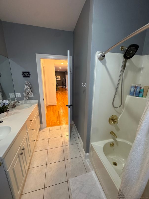 Bathroom, Dual Sink Vanities, Interior, Recessed Lighting, Wood Texture Flooring