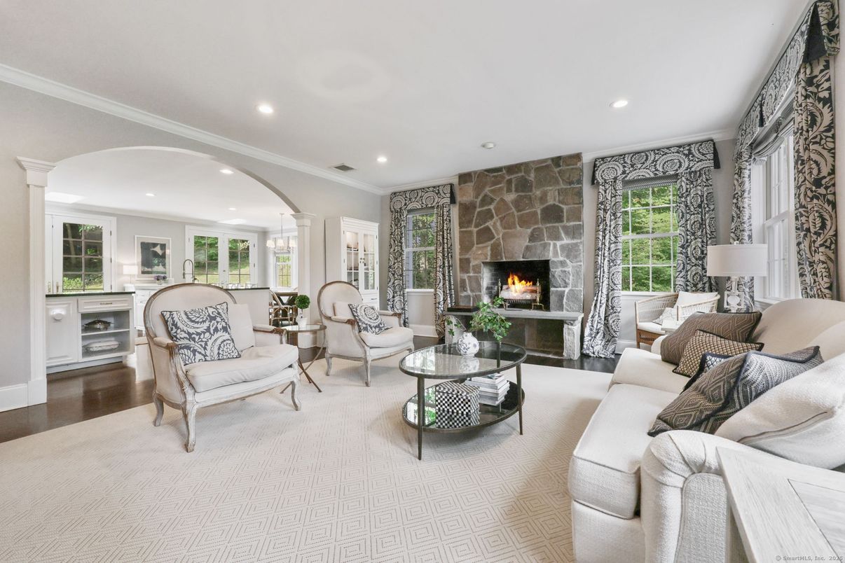 Fireplace, Interior, Living room, Recessed Lighting, Stone Walls, Wood Texture Flooring