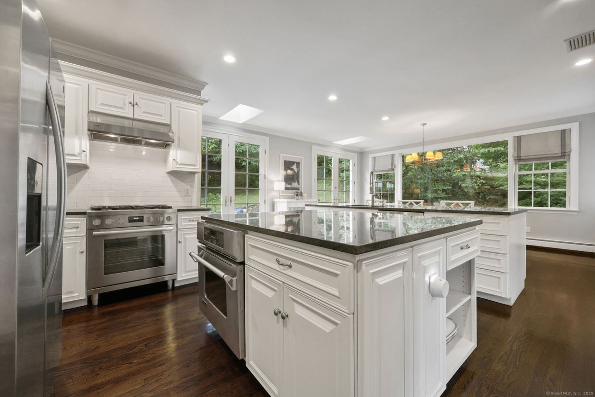 Chandelier, Interior, Kitchen, Recessed Lighting, Stainless Steel Appliances, Wood Texture Flooring