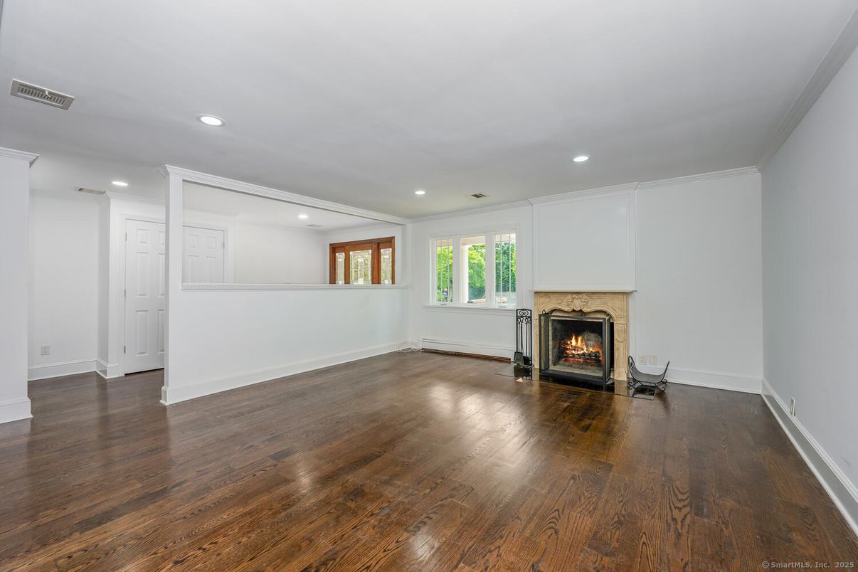 Empty room, Fireplace, Interior, Recessed Lighting, Wood Texture Flooring