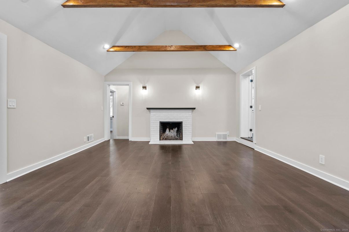 Empty room, Fireplace, Interior, Recessed Lighting, Wooden Beams, Wood Texture Flooring
