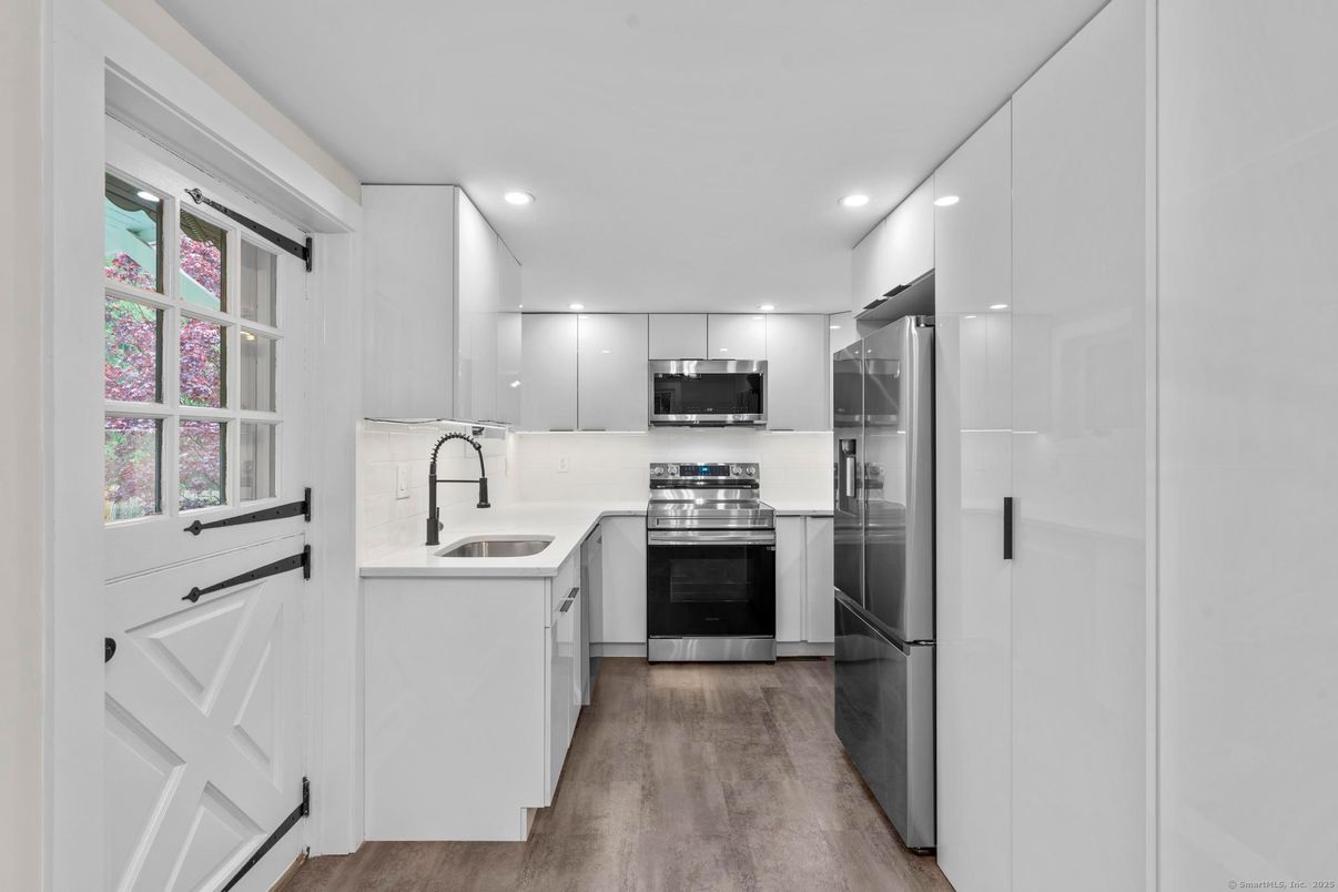 Interior, Kitchen, Recessed Lighting, Stainless Steel Appliances, Wood Texture Flooring