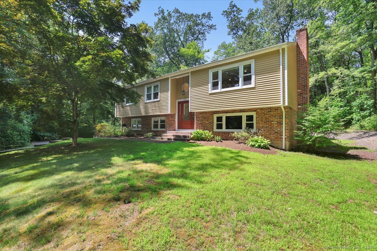 Exterior, Facade, Brick Facade, Raised Ranch