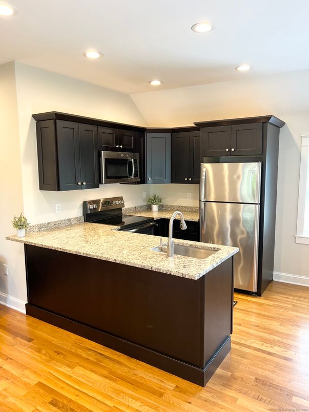 Interior, Kitchen, Recessed Lighting, Stainless Steel Appliances, Wood Texture Flooring