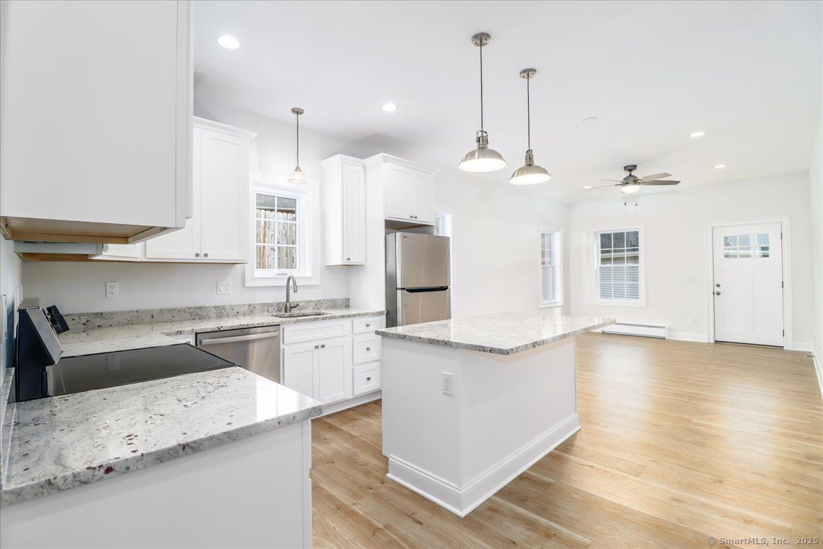 Interior, Kitchen, Pendant Lights, Recessed Lighting, Stainless Steel Appliances, Wood Texture Flooring