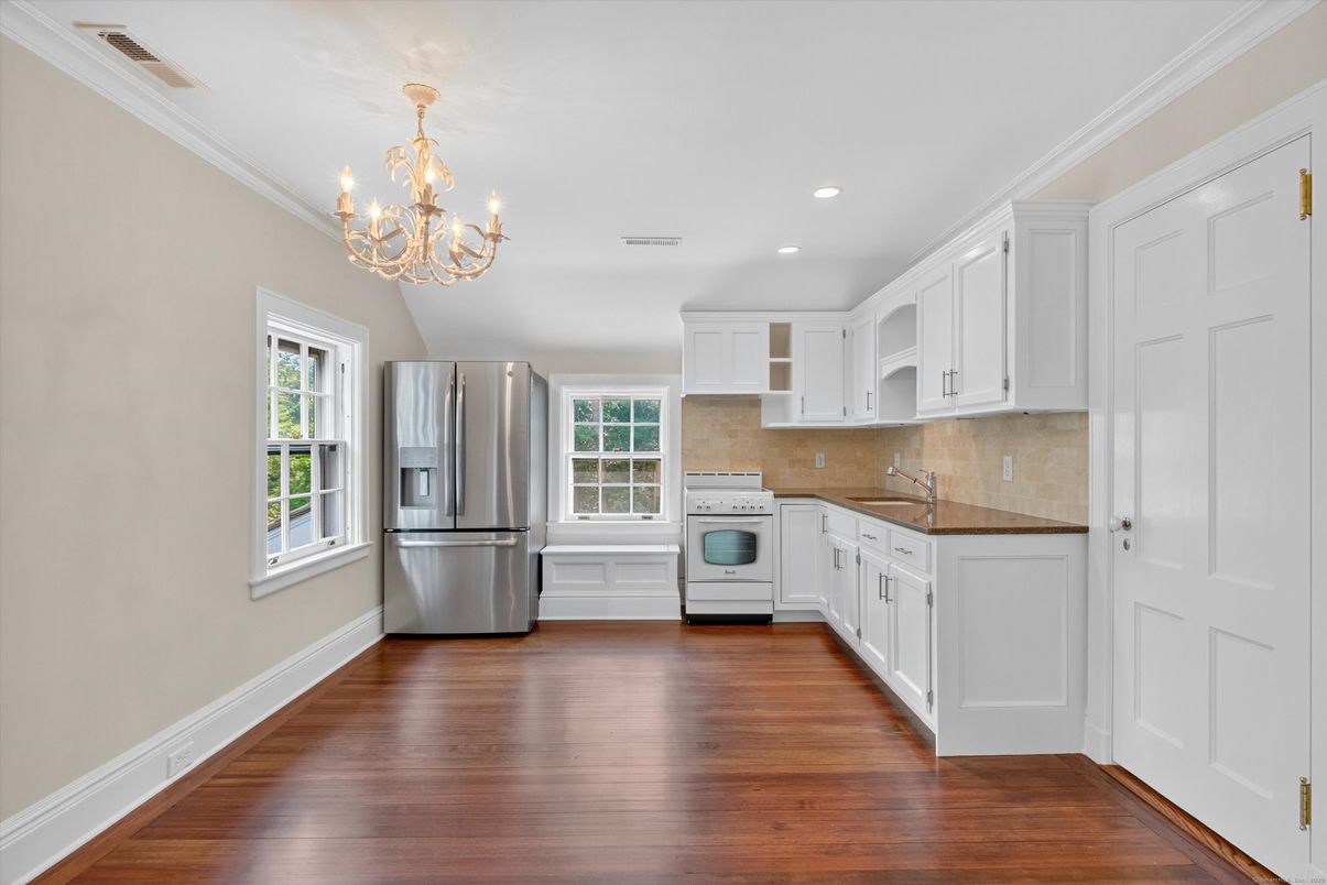 Chandelier, Interior, Kitchen, Recessed Lighting, Stainless Steel Appliances, Wood Texture Flooring