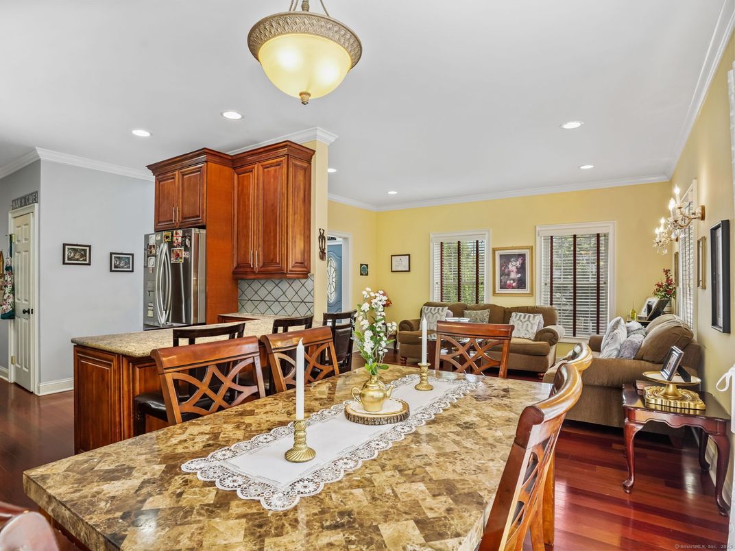 Dining room, Interior, Kitchen, Living room, Recessed Lighting, Stainless Steel Appliances, Wood Texture Flooring