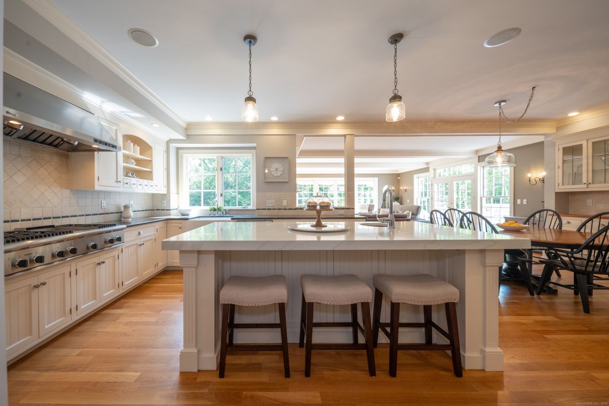 Dining room, Interior, Kitchen, Pendant Lights, Recessed Lighting, Stainless Steel Appliances, Wood Texture Flooring