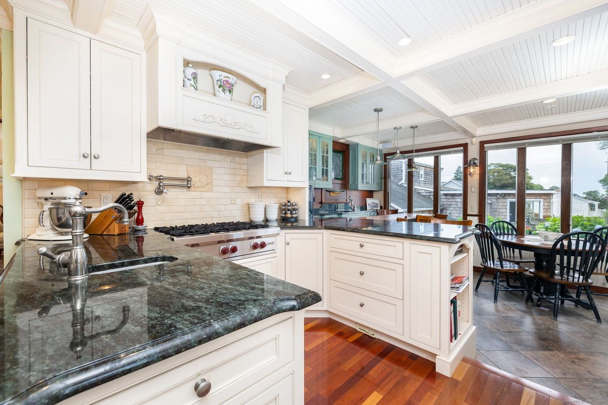 Dining room, Interior, Kitchen, Pendant Lights, Recessed Lighting, Stainless Steel Appliances, Water, Wood Texture Flooring