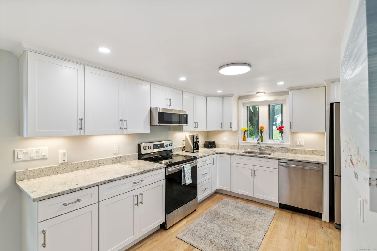 Interior, Kitchen, Recessed Lighting, Stainless Steel Appliances, Wood Texture Flooring
