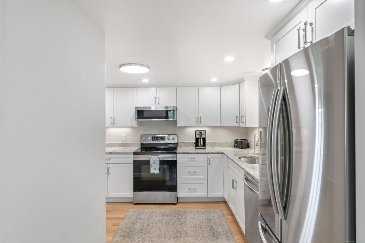 Interior, Kitchen, Recessed Lighting, Stainless Steel Appliances, Wood Texture Flooring