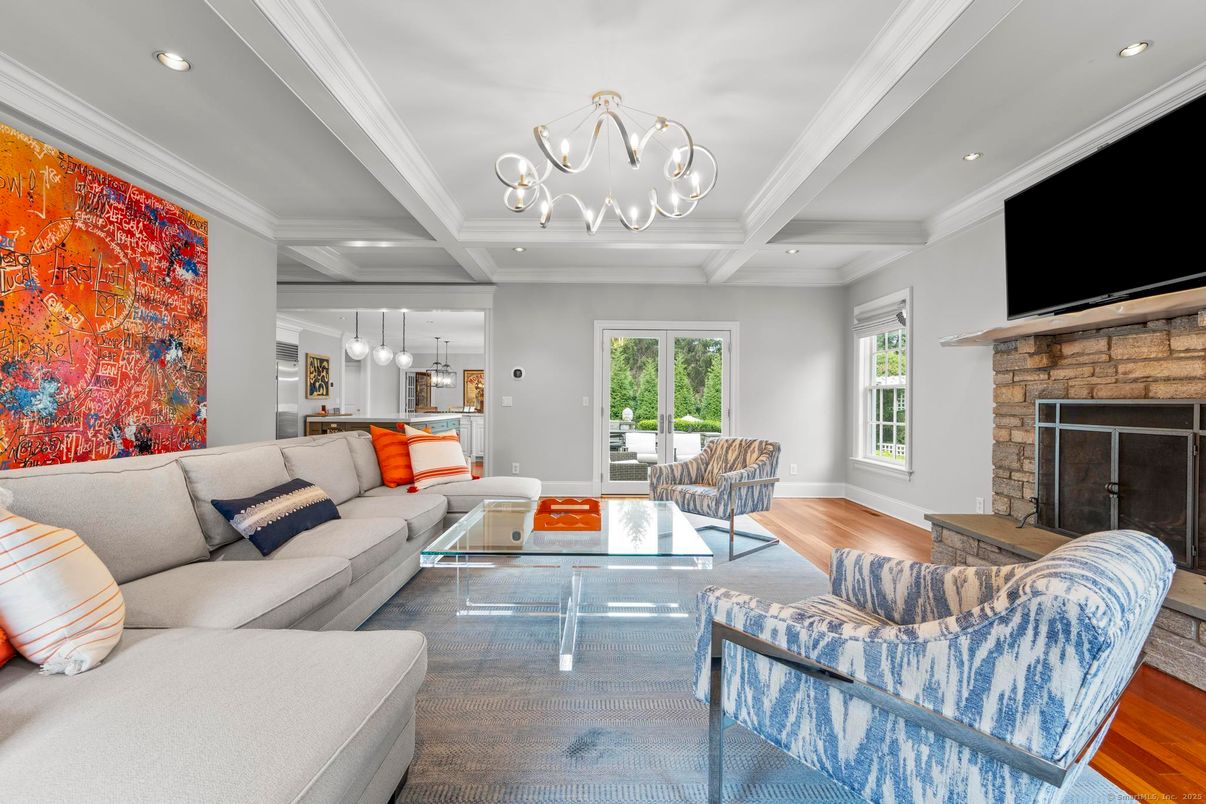 Chandelier, Fireplace, Interior, Living room, Pendant Lights, Recessed Lighting, Wood Texture Flooring