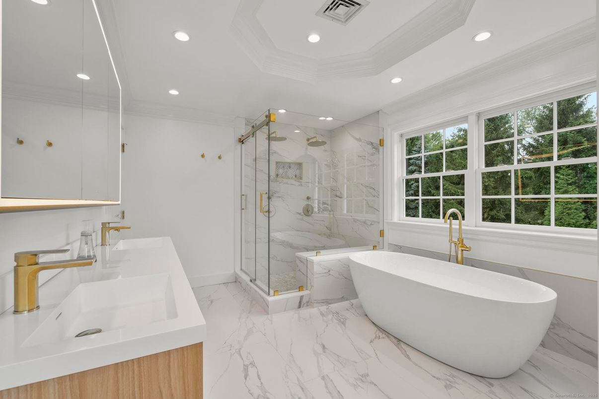Bathroom, Dual Sink Vanities, Free Standing Baths, Glass Shower, Interior, Marble, Marble Walls, Recessed Lighting