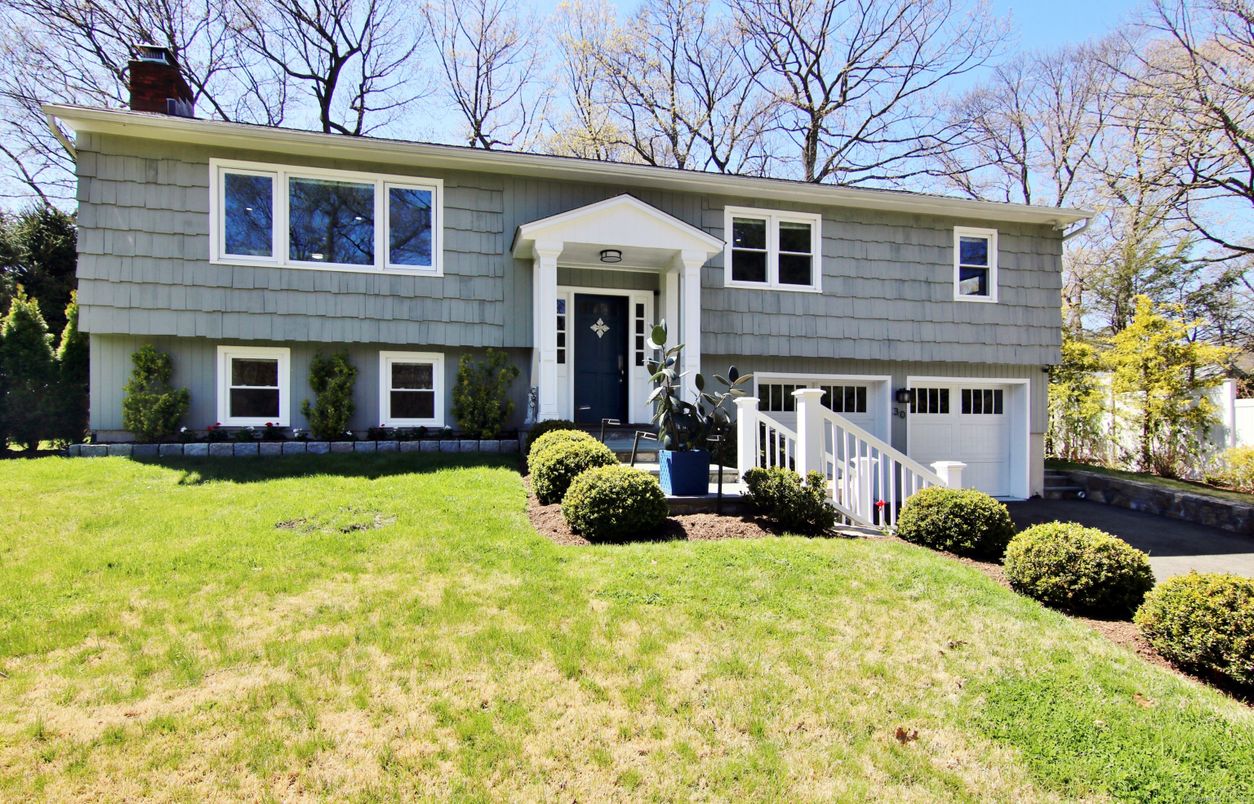 Attached, Exterior, Facade, Raised Ranch