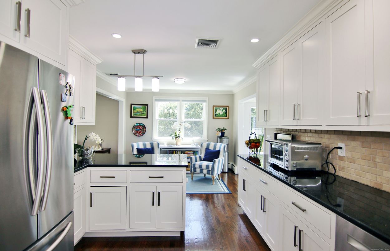 Dining room, Interior, Kitchen, Pendant Lights, Recessed Lighting, Stainless Steel Appliances, Wood Texture Flooring