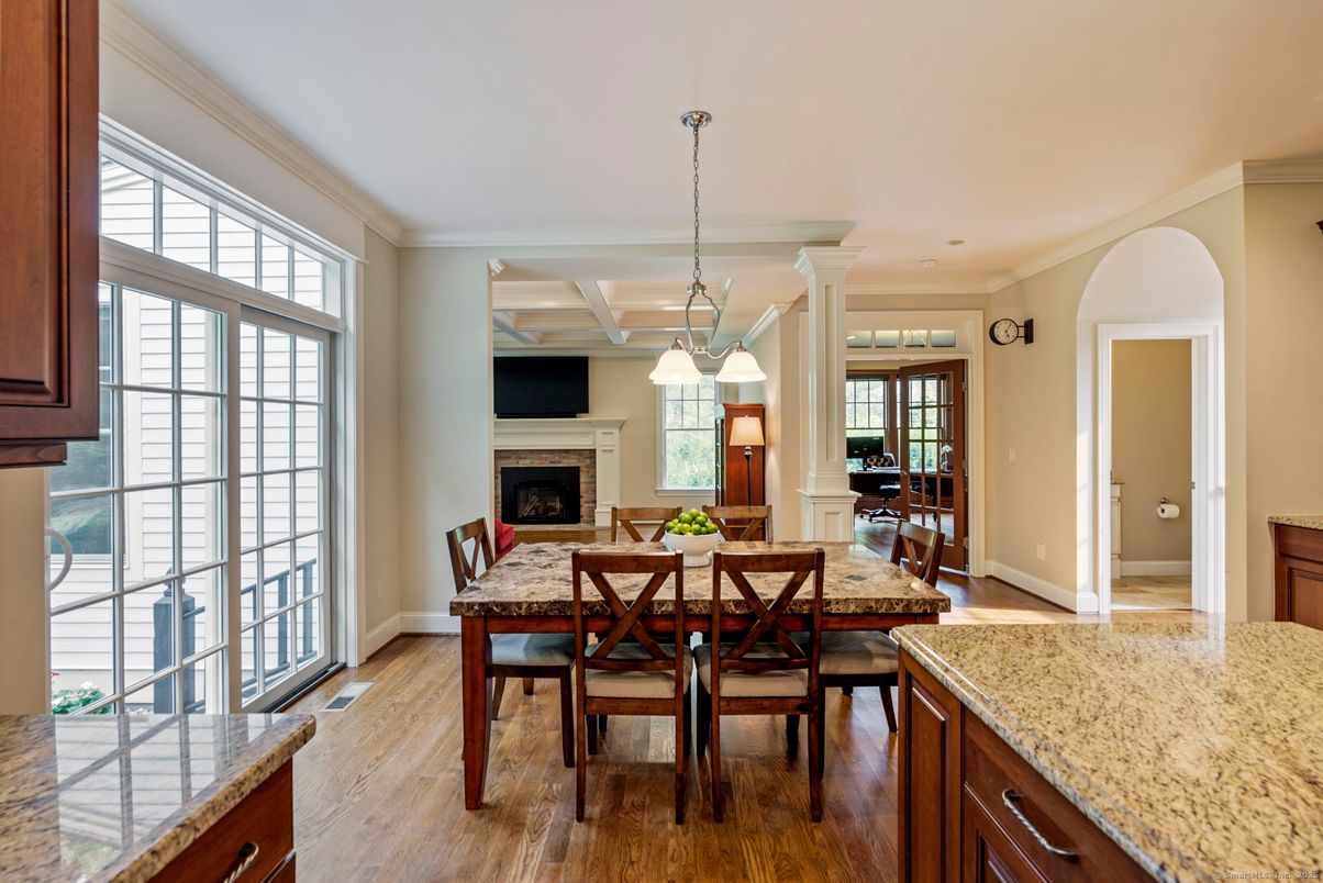 Dining room, Fireplace, Interior, Pendant Lights, Recessed Lighting, Wood Texture Flooring