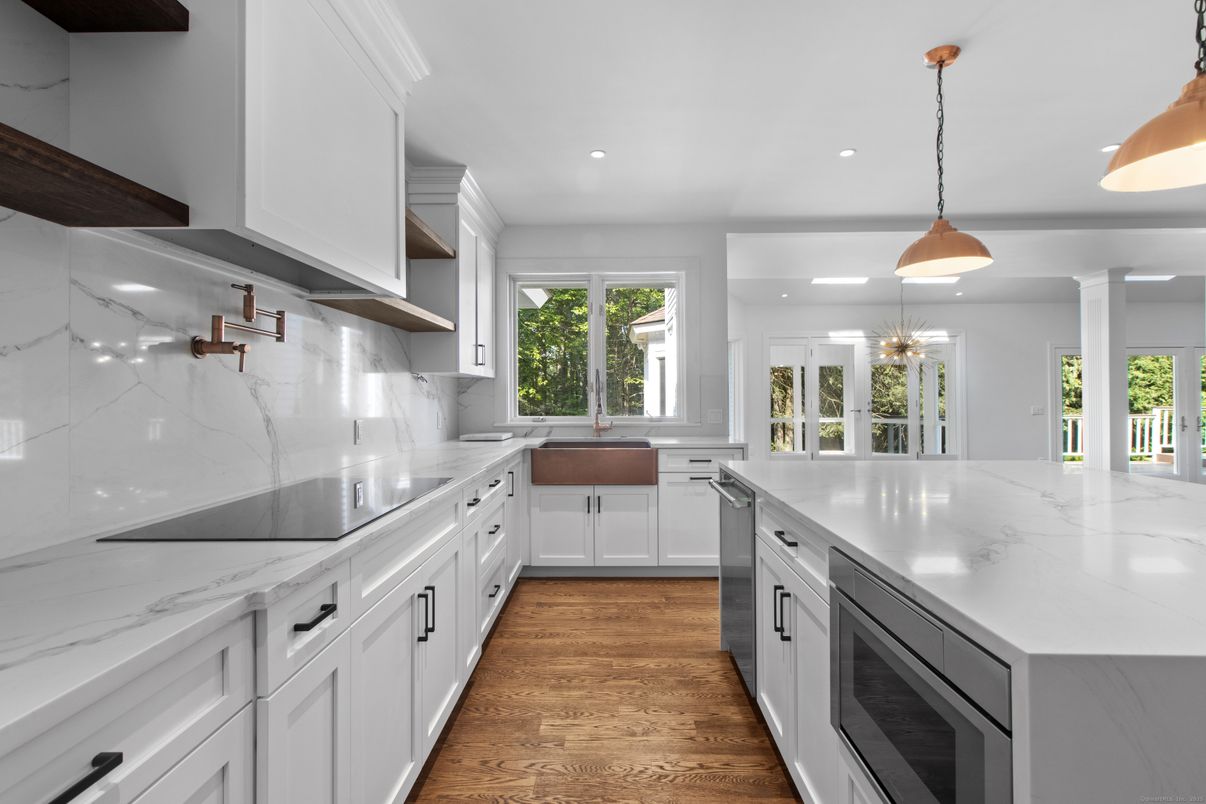 Interior, Kitchen, Marble Walls, Pendant Lights, Recessed Lighting, Wood Texture Flooring