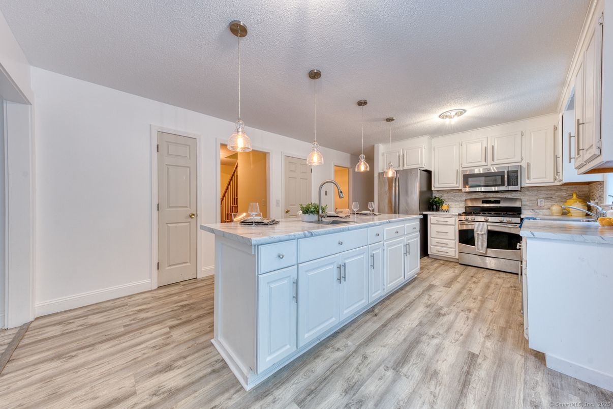Interior, Kitchen, Pendant Lights, Stainless Steel Appliances, Wood Texture Flooring