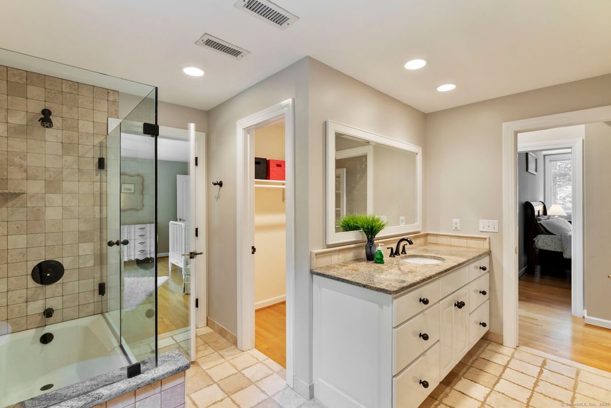 Bathroom, Bedroom, Glass Shower, Interior, Recessed Lighting, Wood Texture Flooring