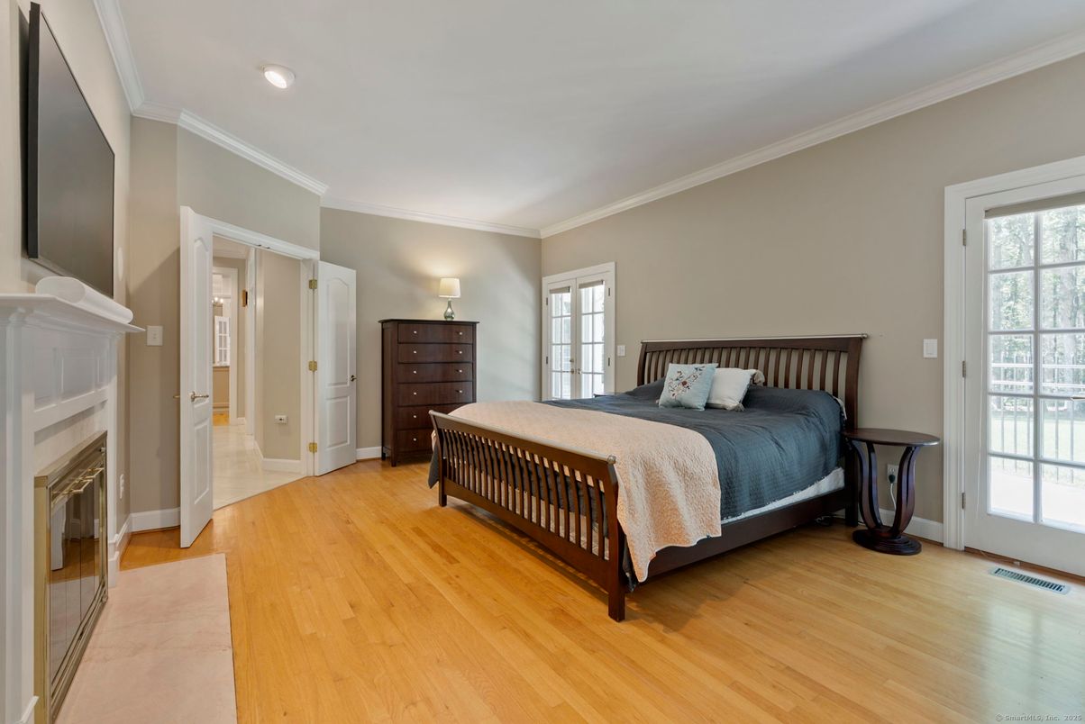Bedroom, Fireplace, Interior, Recessed Lighting, Wood Texture Flooring