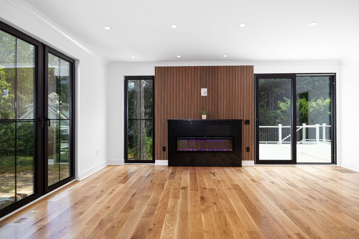 Fireplace, Interior, Pendant Lights, Recessed Lighting, Wood Texture Flooring