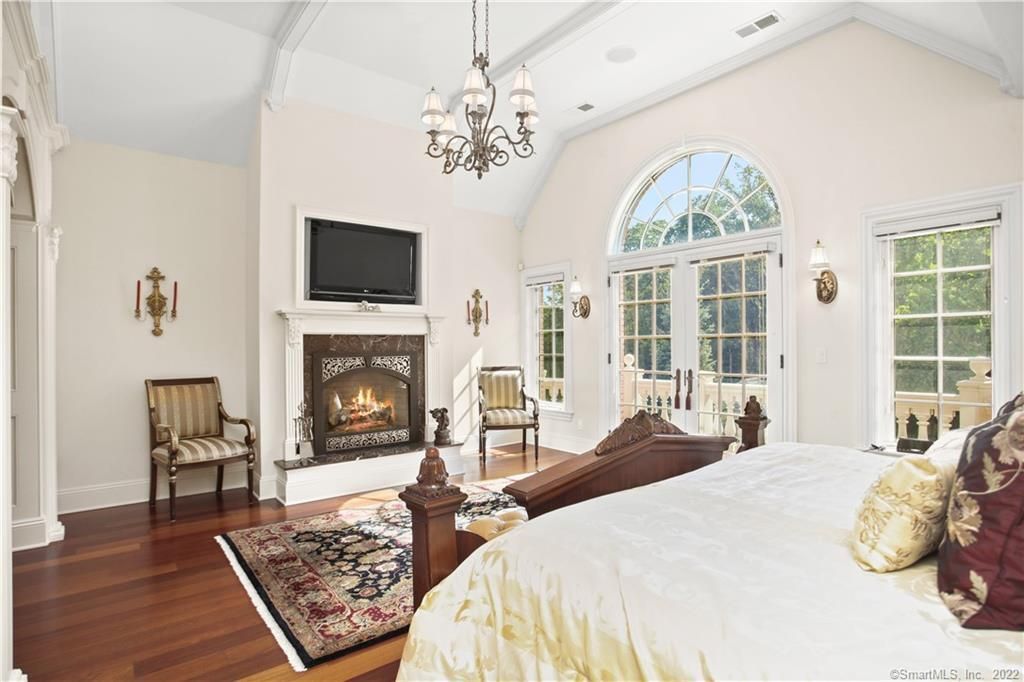 Bedroom, Chandelier, Fireplace, Interior, Wood Texture Flooring
