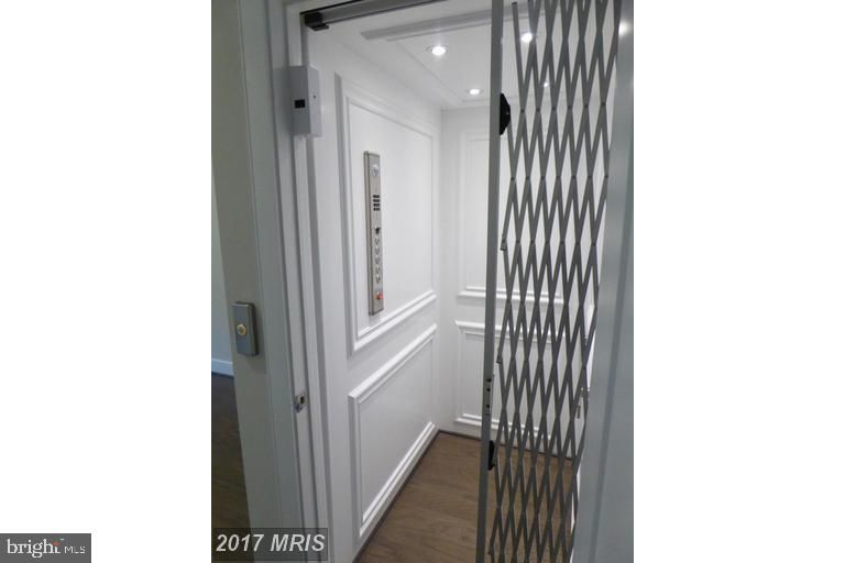 Elevator, Interior, Recessed Lighting, Wood Texture Flooring