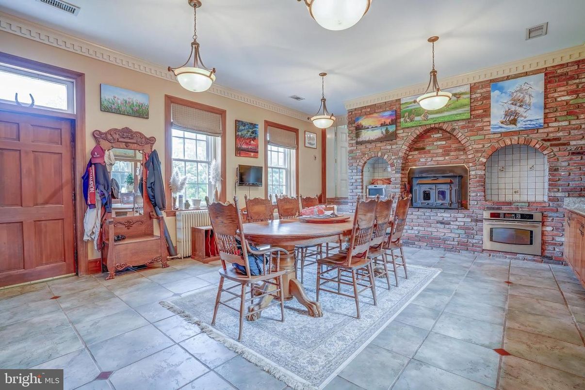 Dining room, Fireplace, Interior, Pendant Lights, Stone Walls